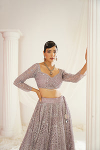 Lavender embroidered dori and mirror work blouse, lehenga and dupatta set