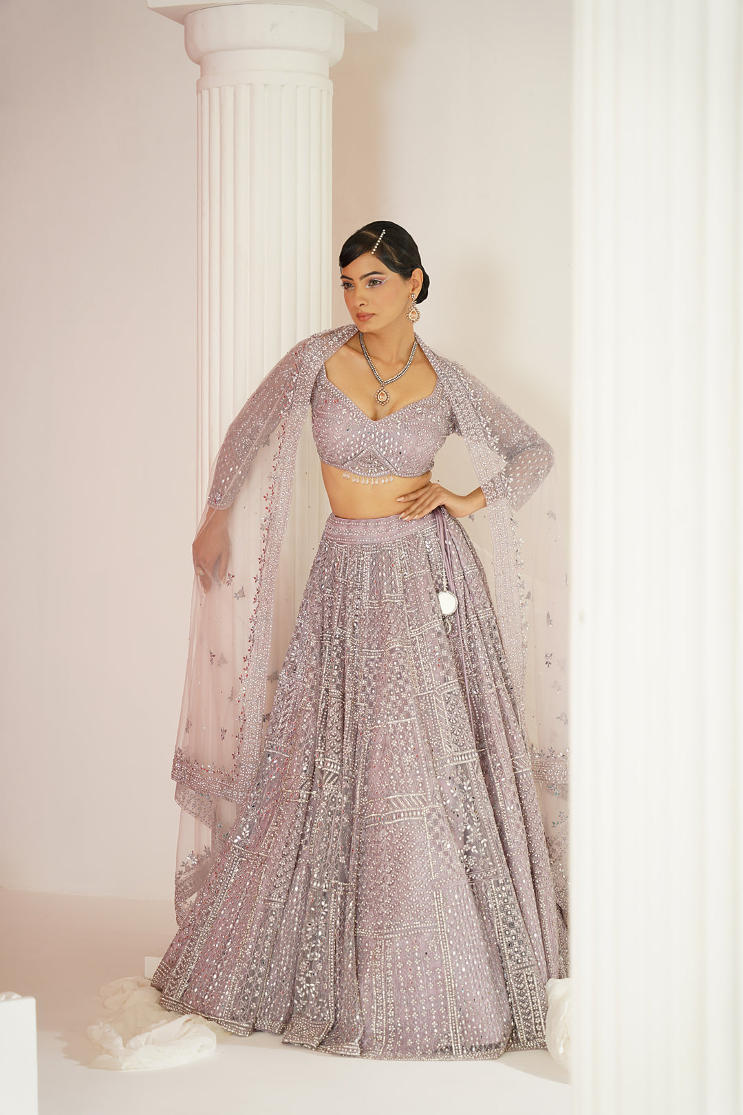 Lavender embroidered dori and mirror work blouse, lehenga and dupatta set