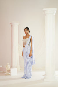 Powder blue embroidered corset blouse with ready to wear drape saree set