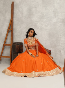 Orange embroidered blouse, lehenga and dupatta set