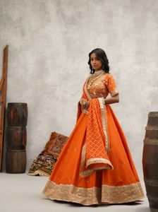 Orange embroidered blouse, lehenga and dupatta set