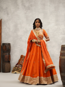 Orange embroidered blouse, lehenga and dupatta set